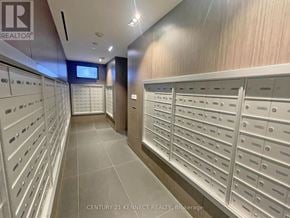 Toronto (Moss Park) condo for rent - A brokerage office with a row of mailboxes.