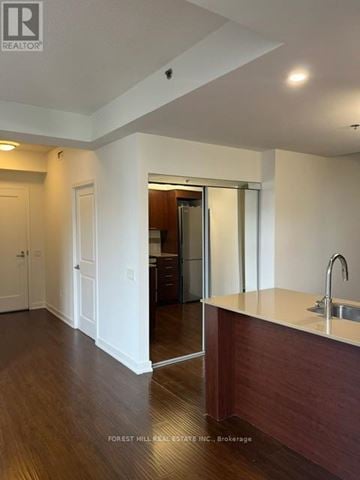Toronto (Forest Hill South) house for rent - A kitchen area with a sink and a refrigerator.