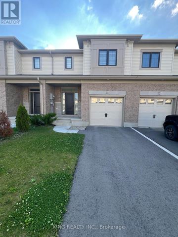 St. Thomas townhouse for rent - A house with a driveway in front of it.