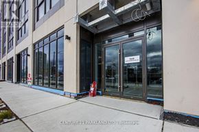Toronto (High Park-Swansea) condo for rent - The image shows the front of a building with a glass door and a sign that reads "1929".