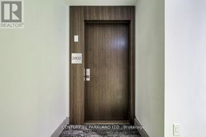 Toronto (High Park-Swansea) condo for rent - A brown door with the number 2802 on it.