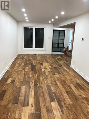 Mississauga (Meadowvale) apartment for rent - A room with wooden flooring and white walls.