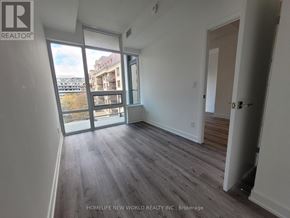 Toronto (Bayview Village) condo for rent - A room with a view of a building outside the window.