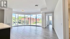 Toronto (Forest Hill North) condo for rent - A realtor's office with a view of a city street through the windows.