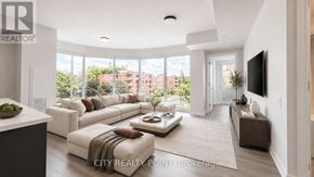 Toronto (Forest Hill North) condo for rent - A modern living room with a large window and a flat screen TV mounted on the wall.