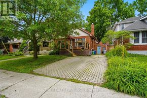 London South (South E) apartment for rent - A brick house with a driveway in front of it.