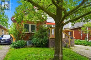 London South (South E) apartment for rent - A house with a tree in front of it.