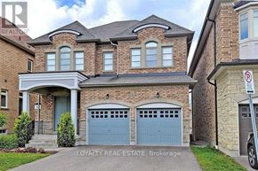 Richmond Hill (Oak Ridges) apartment for rent - A house with a garage and a sign that says "No Parking".