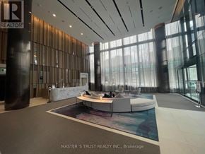 Toronto (North St. James Town) condo for rent - A reception area with a large table and chairs.