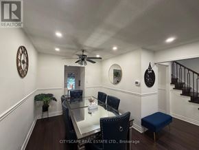 Mississauga (Erin Mills) apartment for rent - A well-lit room with a glass table and chairs.