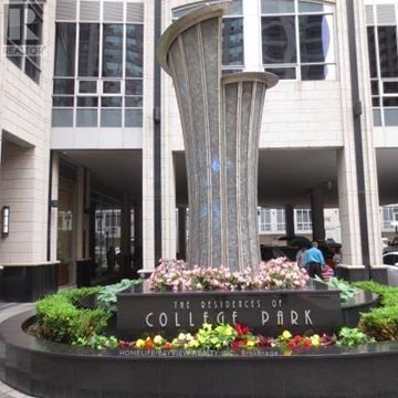 Toronto (Bay Street Corridor) condo for rent - A large building with a sign that says "The Residences of College Park".