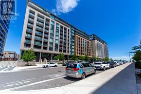 Vaughan condo for rent - A street view with a car in the foreground and a multi-story building in the background.