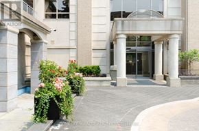 Toronto (Willowdale West) condo for rent - A building with a sign that says "REALTOR" on the left side.