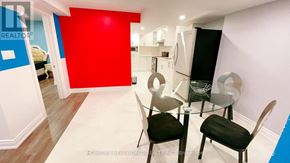 Richmond Hill (Devonsleigh) apartment for rent - A dining room with a glass table and chairs.