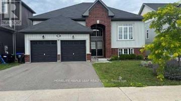 Clearview (Stayner) apartment for rent - A two-story house with a garage is for sale.