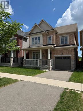 New Tecumseth (Tottenham) apartment for rent - A two-story house with a garage and a front porch.