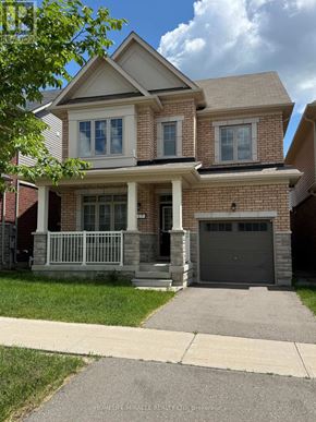 New Tecumseth (Tottenham) apartment for rent - A two-story house with a garage and a front porch.