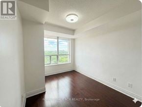 Toronto (Willowdale East) condo for rent - A room with a window that shows a view of the outdoors.