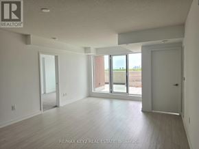 Toronto (Humber Heights) condo for rent - A spacious room with a sliding glass door leading to a balcony.