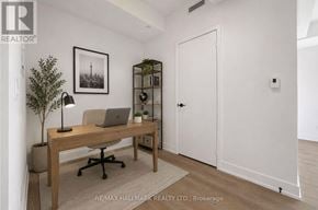 Toronto (Church-Yonge Corridor) condo for rent - A room with a desk, chair, and a plant.