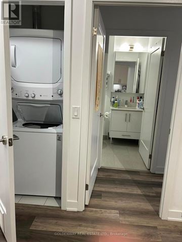 Richmond Hill (Langstaff) condo for rent - A white oven and dishwasher in a small kitchen.