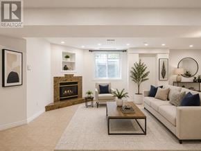 Vaughan (Maple) apartment for rent - A living room with a fireplace and a couch.