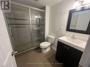 Markham (Milliken Mills West) apartment for rent - A bathroom with a toilet, sink, and shower.
