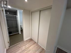 Markham (Milliken Mills West) apartment for rent - A room with a sliding glass door and a white wall.