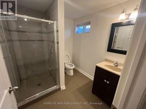 Markham (Milliken Mills West) apartment for rent - A bathroom with a walk-in shower, toilet, and sink.