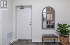 Milton (Om Old Milton) condo for rent - A realtor photo of a white door with a mirror above it.