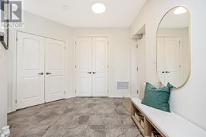 Milton (Om Old Milton) condo for rent - A room with a bench and a mirror.