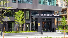 Toronto (Mount Pleasant West) condo for rent - The building at 110-120 Broadway Avenue is a modern structure with a glass facade.