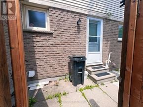 Toronto (Milliken) apartment for rent - A small house with a window and a door.