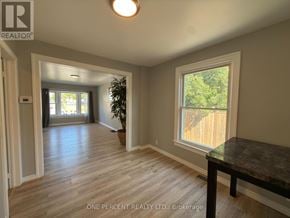 Niagara Falls (Downtown) apartment for rent - A room with a table and a plant in it.