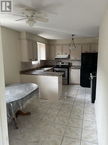 Toronto (Glenfield-Jane Heights) apartment for rent - A kitchen with a table and chairs in it.