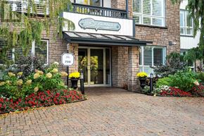 Collingwood condo for rent - The entrance to a building with a sign that reads "The Islander" and a number 750 on the door.