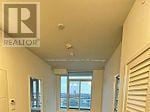 Brampton (Northwest Brampton) condo for rent - A realtor sign is on the wall in a room.