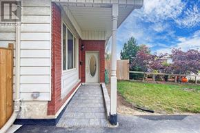 Hamilton (Lawfield) apartment for rent - A house with a realtor sign on the front.