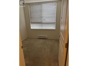 Vancouver apartment for rent - A room with a window and a heater.