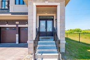 Vaughan (Kleinburg) apartment for rent - A house with a realtor sign on the window.