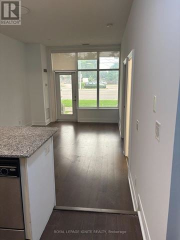 Toronto (Clanton Park) condo for rent - A kitchen with a granite counter top and a dishwasher.