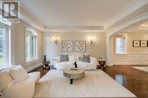 Richmond Hill (Oak Ridges Lake Wilcox) apartment for rent - A living room with a white sofa and a coffee table.