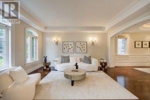Richmond Hill (Oak Ridges Lake Wilcox) apartment for rent - A living room with a white sofa and a coffee table.