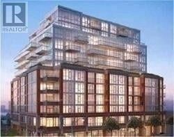 Toronto (High Park North) condo for rent - A modern building with a glass facade is shown in the image.
