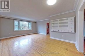 Toronto (Willowdale West) apartment for rent - A room with wooden flooring and a large window.