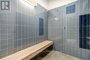 Toronto (St. Andrew-Windfields) townhouse for rent - A bathroom with a bench and tiled walls.
