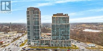 Milton (Co Coates) condo for rent - Two tall buildings are shown in an aerial view with a REALTOR® logo in the corner.