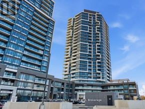 Milton (Co Coates) condo for rent - Two tall buildings with glass windows and a sign that reads "HOMELIFE/MIRACLE HEALTH & DENT.".