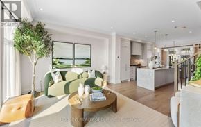 Mississauga (Mineola) townhouse for rent - A modern living room with a green sofa and a coffee table.