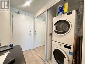 Toronto (Church-Yonge Corridor) condo for rent - A white washing machine is in a small laundry room.